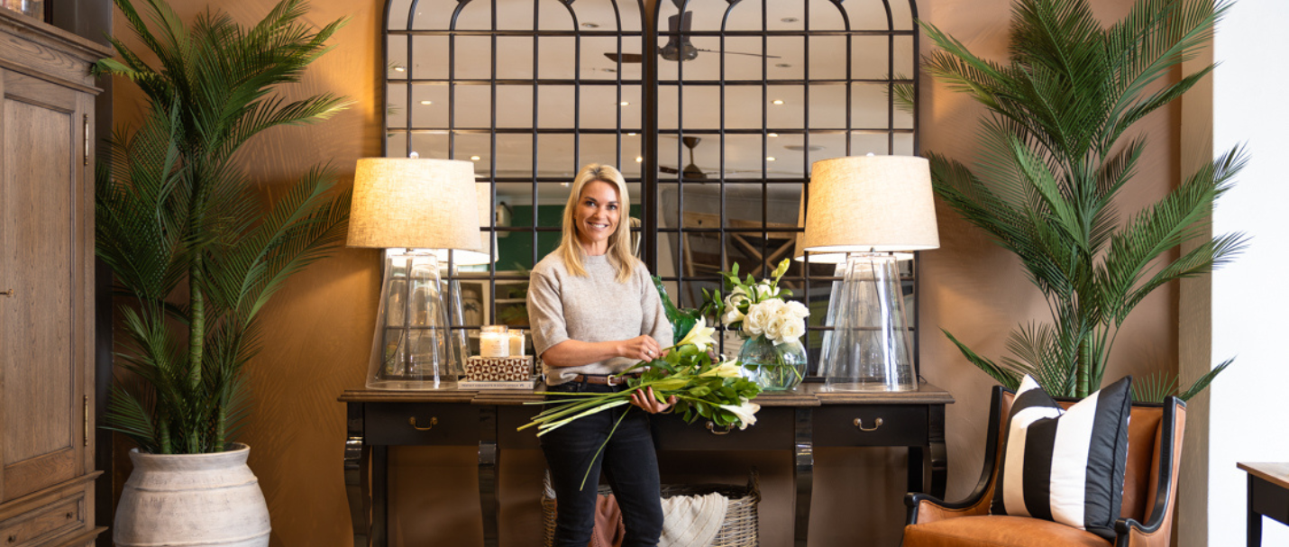 How to Style Your Entrance Hall Like an Interior Designer Tammy Holmes from Ivy Decor and design stands in front of a styled console table at Block & Chisel