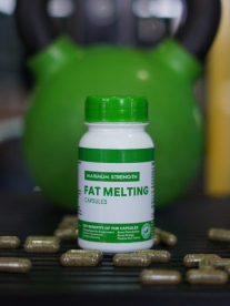 Supplements in front of green kettle