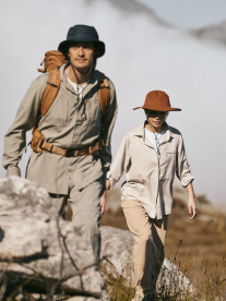 two people hiking in the mountains