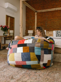 Lady sitting on colourful bean bag
