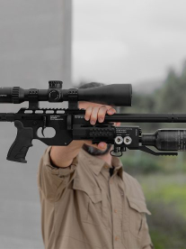 A man holding a rifle