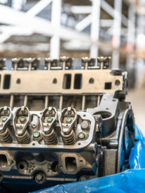 An engine at a Sharp Auto parts store being repaired.
