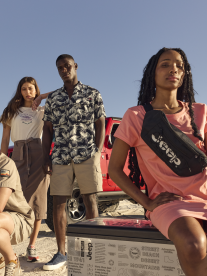 Four attractive youth wearing Jeep clothing.