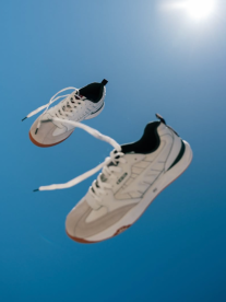 Hi-Tec shoes floating in the air.