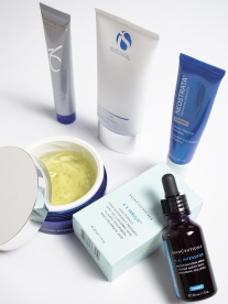 Selection of skincare beauty products from SkinMiles on a white backdrop