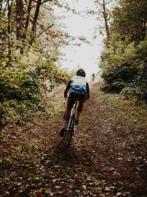 A cyclist on a trail