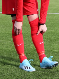 Soccer player and boots